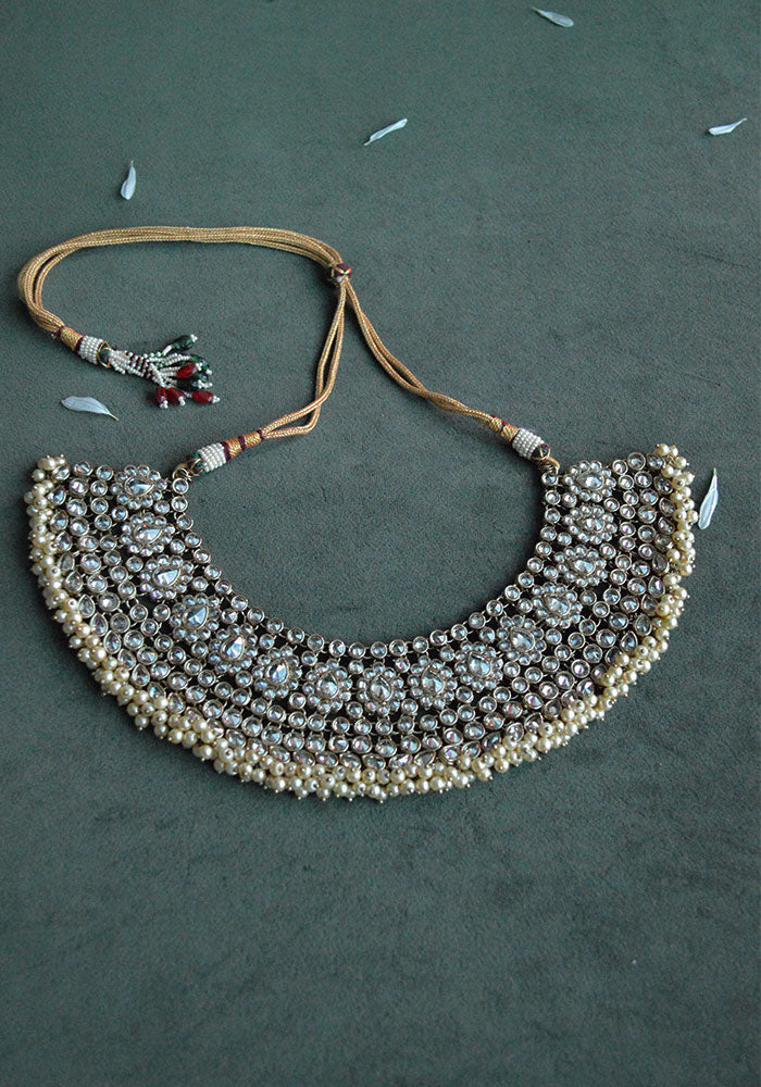 Gold Toned Kundan Necklace Set with Pearl Droplet and Maang Tikka