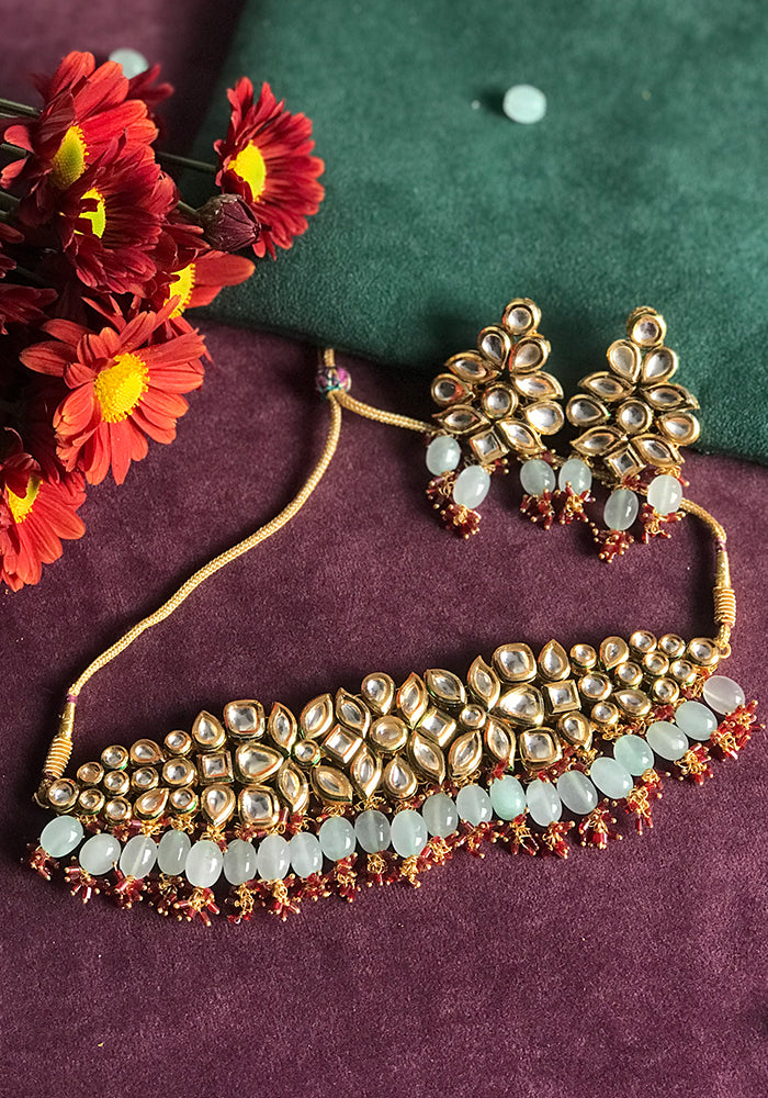 Gold Toned Kundan Necklace Set with Sea Green Droplets