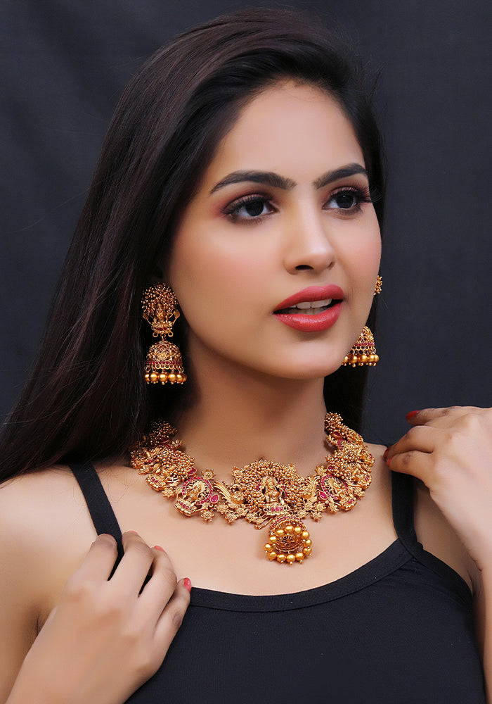 Gold Toned Temple Gold Goddess Necklace with a Pair of Jhumkis