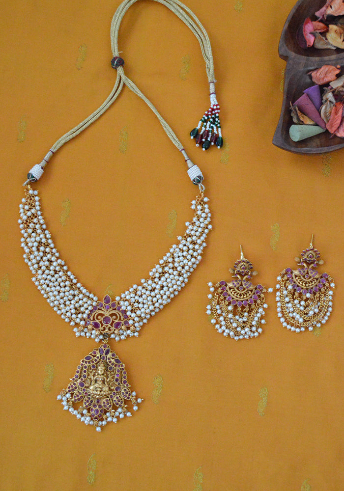 Gold Toned Temple Gold Goddess Pearl Necklace with a Pair of Jhumkis