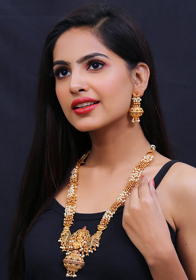Gold Toned Temple Gold Long Necklace with intricate motifs and a Pair of Jhumkis