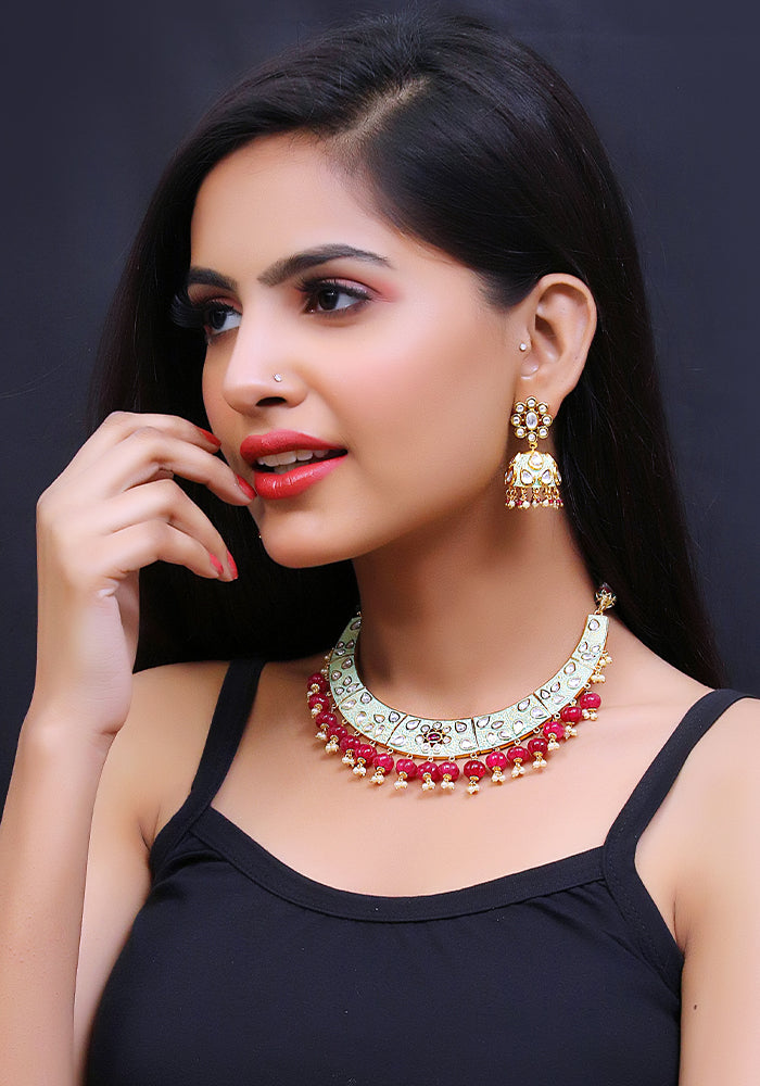 Green Gold Toned Kundan Meenakari Necklace with Ruby Colored Droplets and a Pair of Earrings