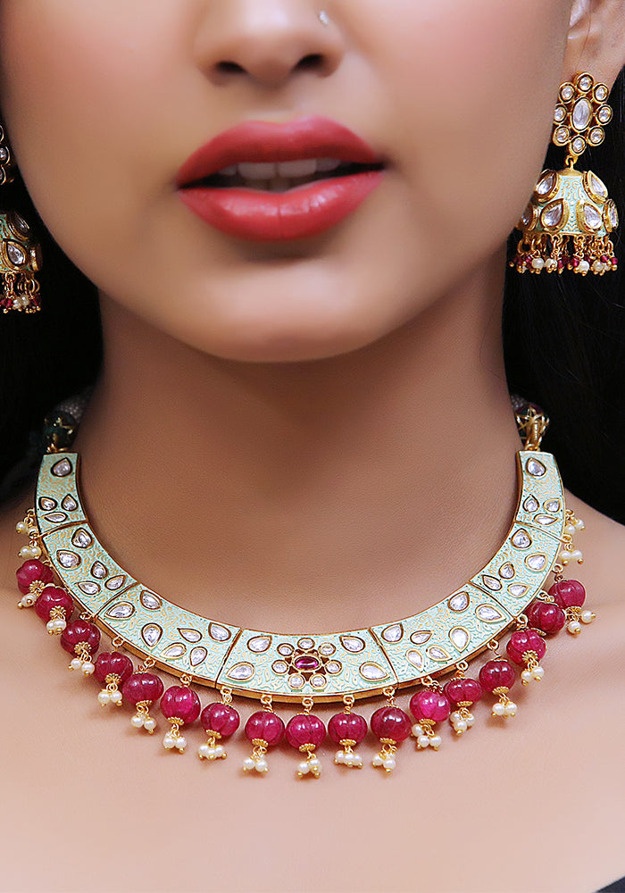 Green Gold Toned Kundan Meenakari Necklace with Ruby Colored Droplets and a Pair of Earrings